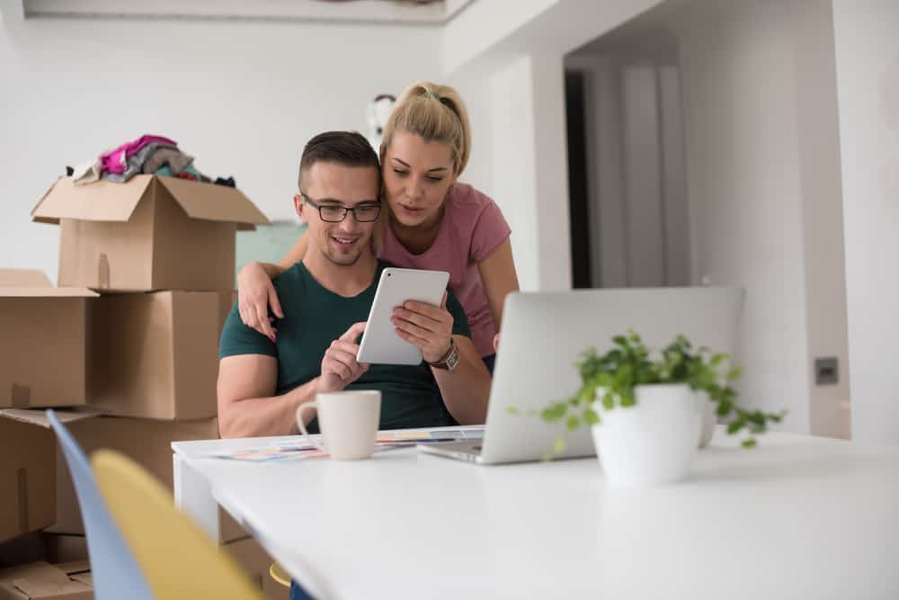 Couple Making a List of Apartments | www.phillyaptrentals.com