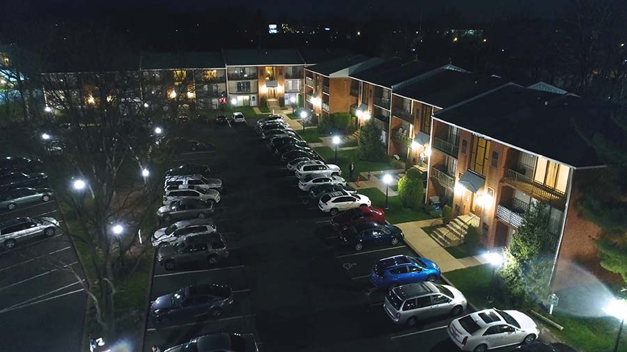 Ambassador I Apartments property aerial view at night