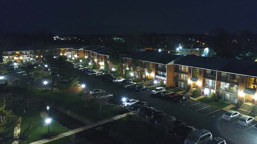 Ambassador I Apartments property aerial view at night