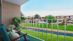 View from the apartment balcony showing the property grounds