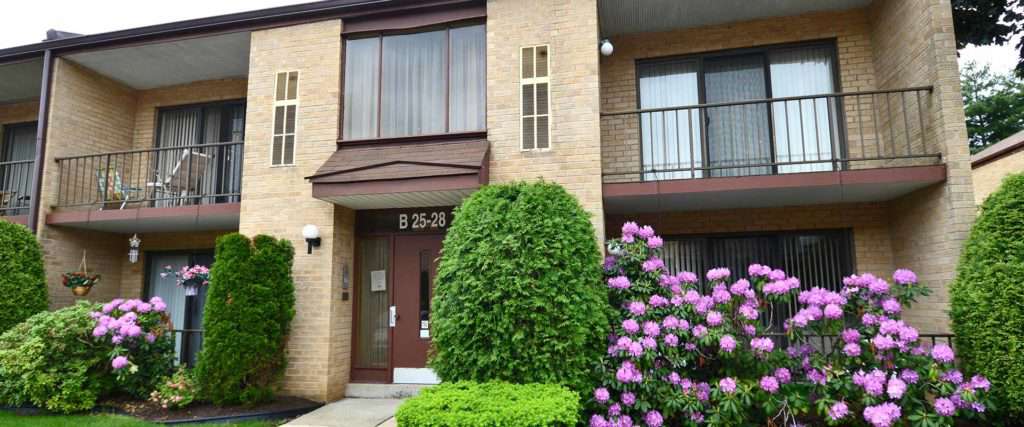 Front of the Ambassador II Apartments Philadelphia, PA. A semi-private stair case is shown to walk up to your unit.