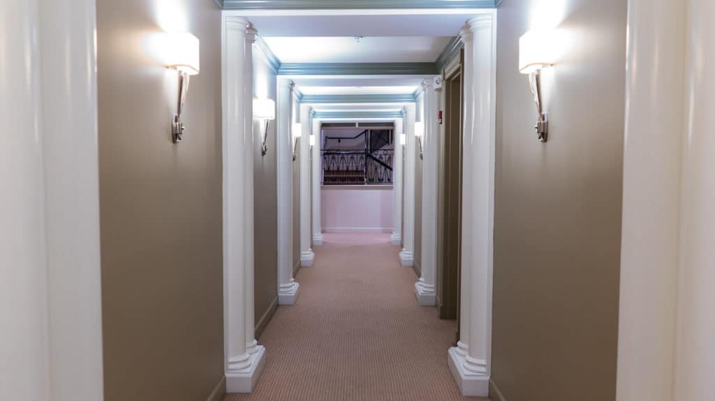 Hallway with Multiple Apartment Doors | www.phillyaptrentals.com