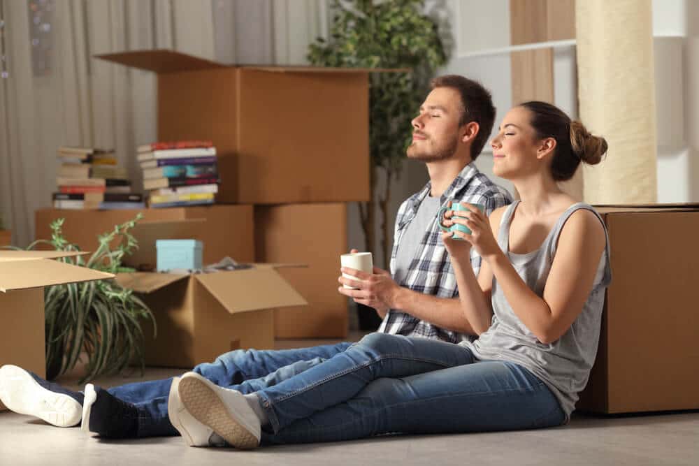 Two Content Renters enjoying coffee after moving in | www.phillyaptrentals.com 